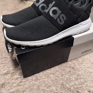 Adidas Men's Black and White Slip-On Sneakers